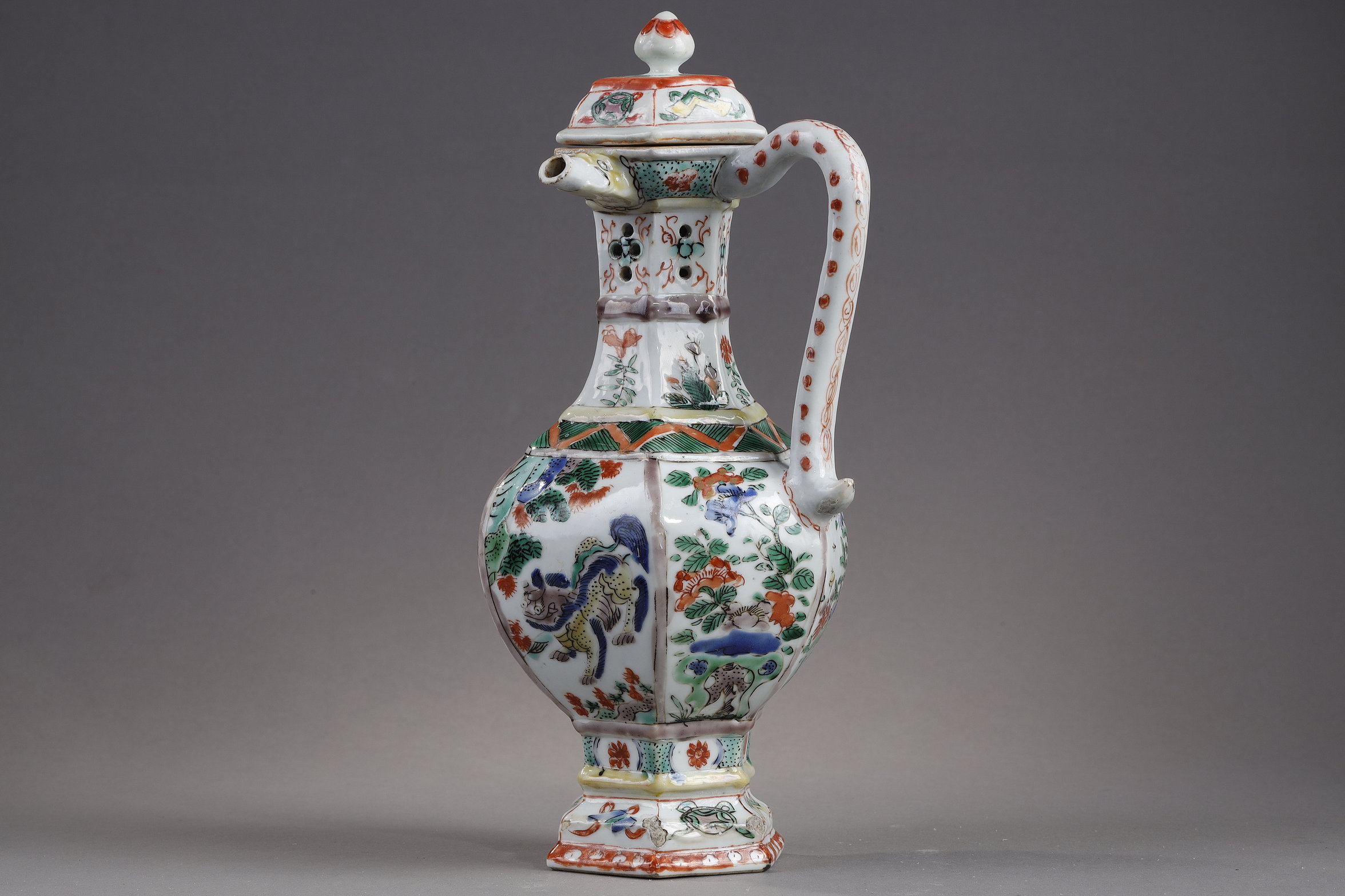 rare hexagonal jug called puzzle or surprise in porcelain of the Famille Verte has decoration of mythical animals flowers and precious objects - China Kangxi Period 1662/1722